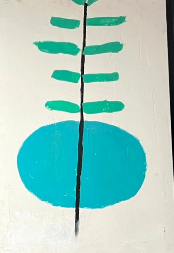 A straight fern with teal leaves growing out of a turquoise circle on white