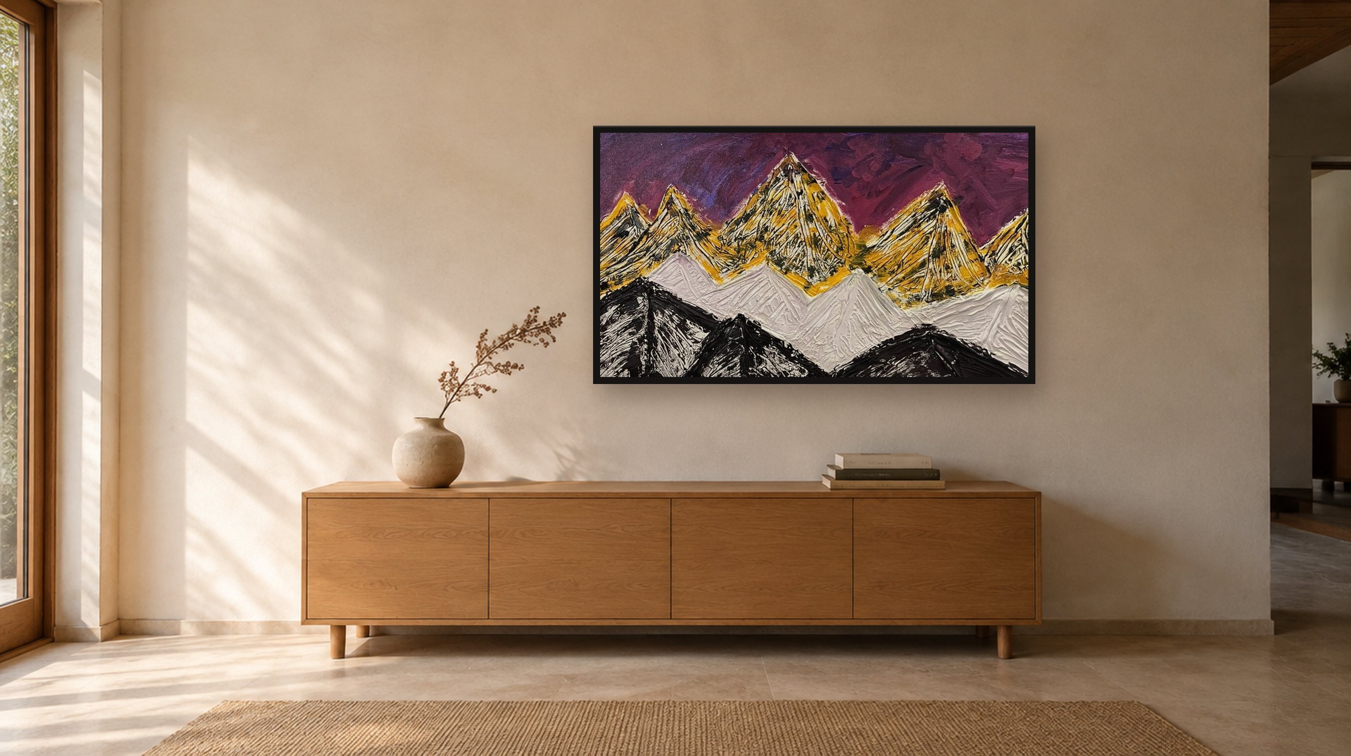 Vivaan's painting of gold and white mountains under a purple sky, hanging above a wooden sideboard in a sunlit room